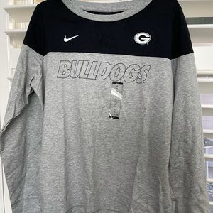 Brand new ladies UGA University of Georgia Nike shirt. Comes from a smoke free